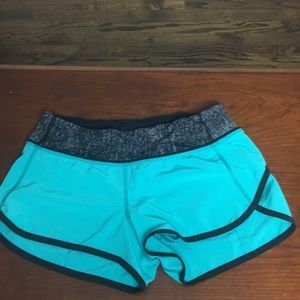 Blue and black shorts.